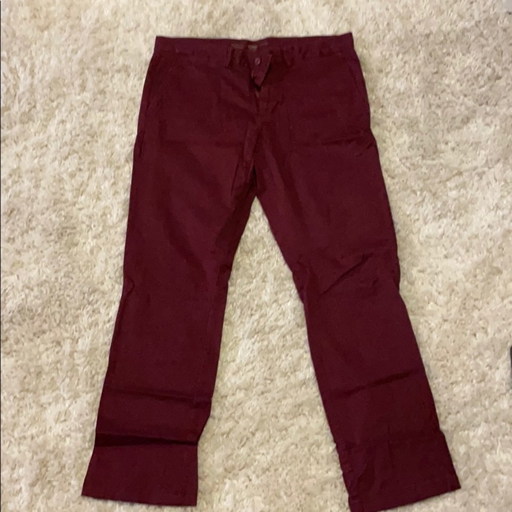 Red khaki pants for men that no longer fit.